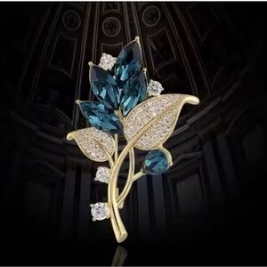 Elegant Gold and Blue Leaf Brooch